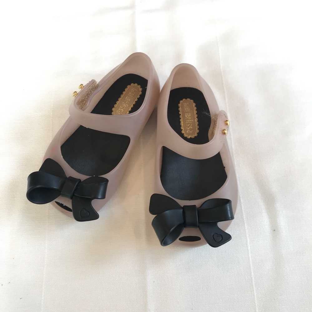 Mini Melissa pink shoes with black bow
